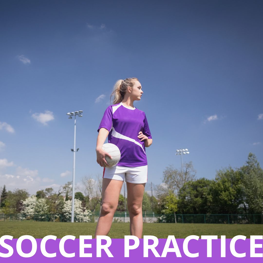 Young Female Soccer Player Holding Ball at Practice