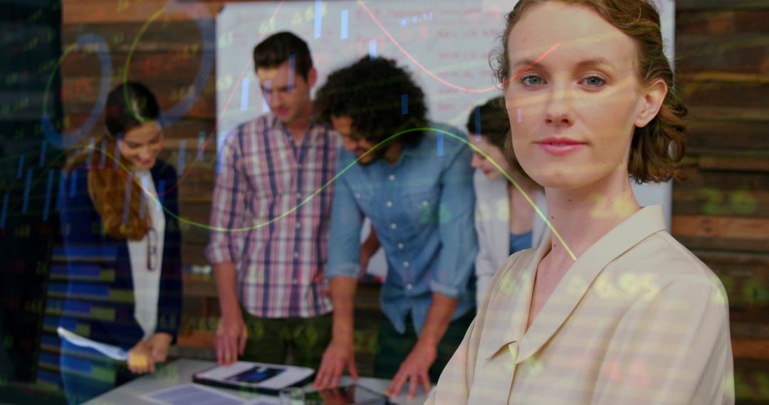 Confident Business Team in Office Analyzing Financial Data