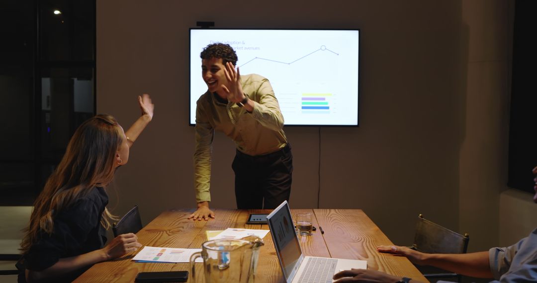 Diverse Team Collaborating During Business Presentation