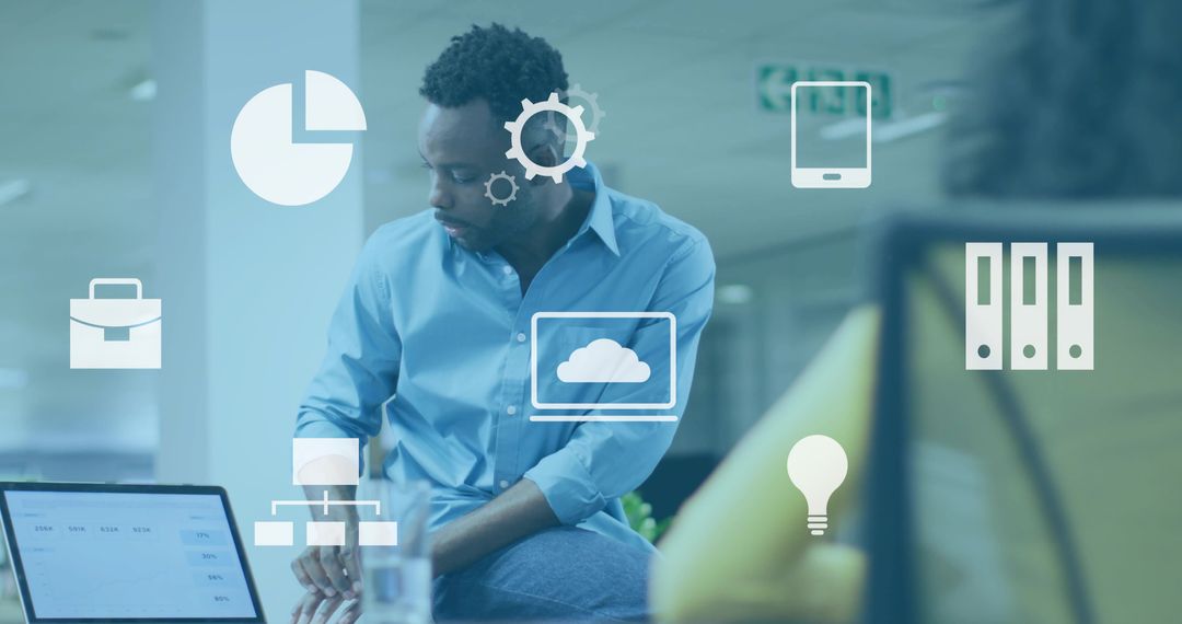 Businessman leaning on desk analyzing cloud data with digital icons for teamwork and analytics