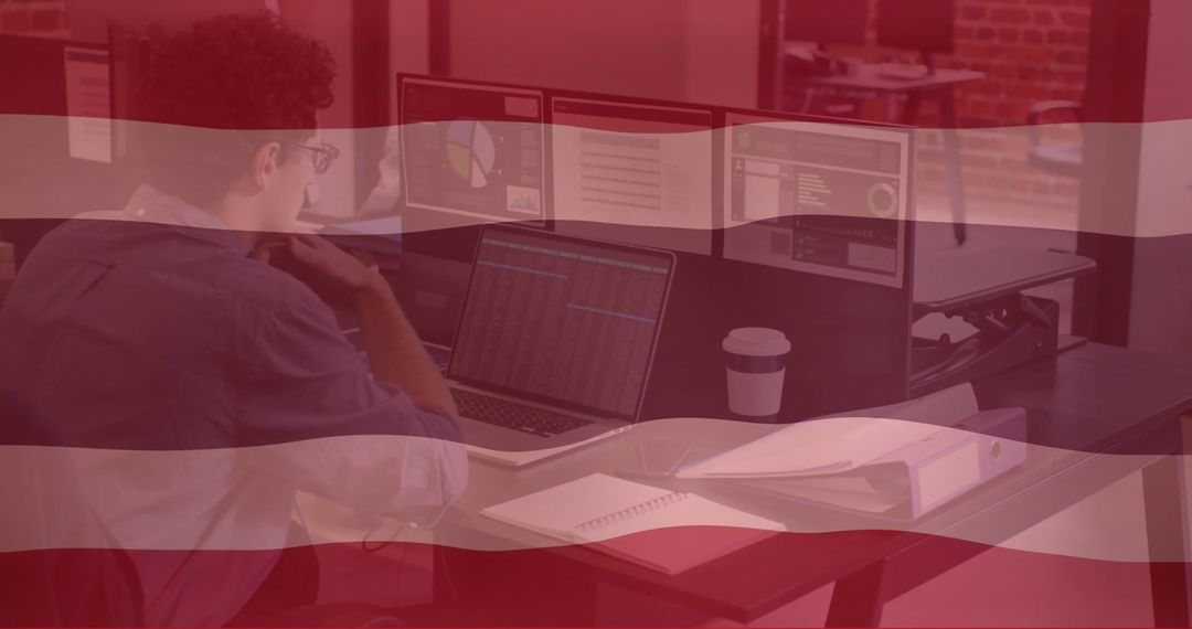 Business Analyst Exploring Data Charts on Computers