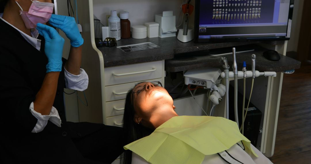 Woman Receiving Dental Examination in Modern Clinic - Free Images, Stock Photos and Pictures on Pikwizard.com