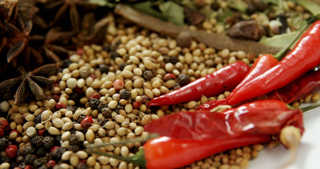 Close-Up of Various Spices and Red Chili Peppers - Free Images, Stock Photos and Pictures on Pikwizard.com