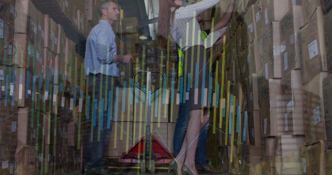 Warehouse Workers Analyzing Graphs Business and Technology Concept