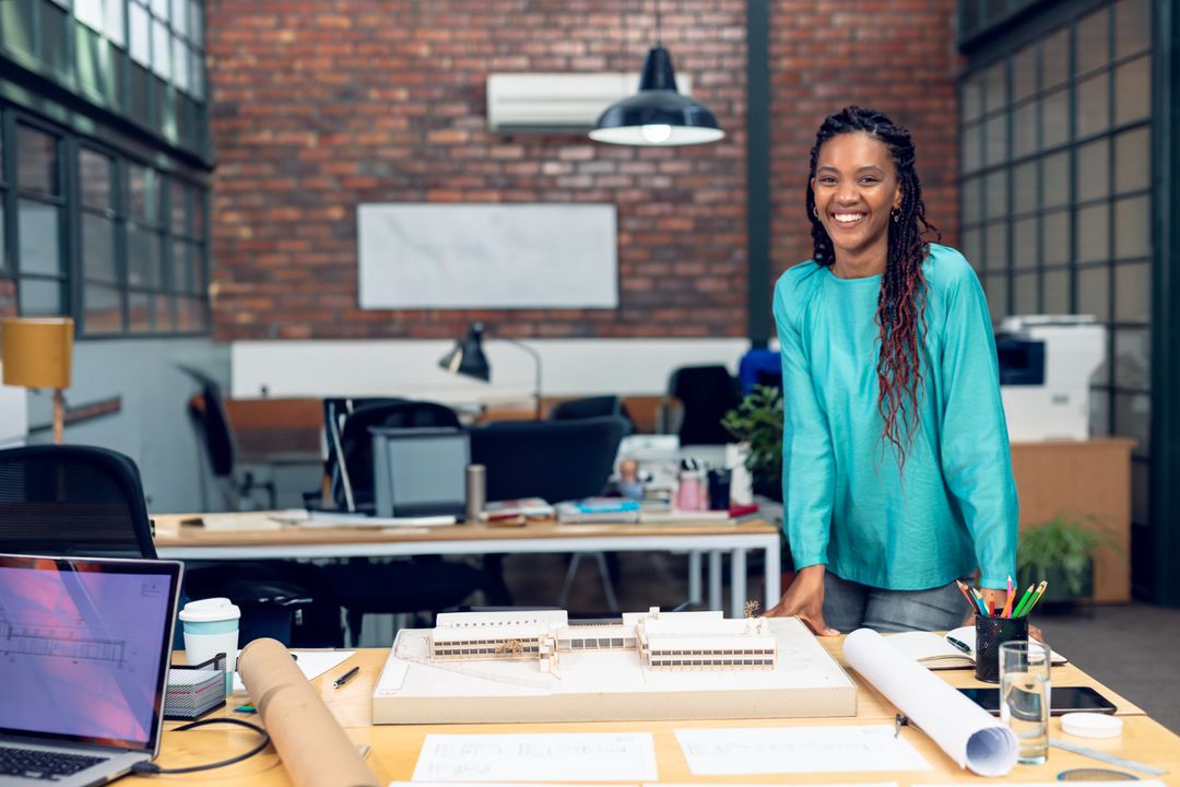 Architectural Designer Smiling Confidently in Modern Office