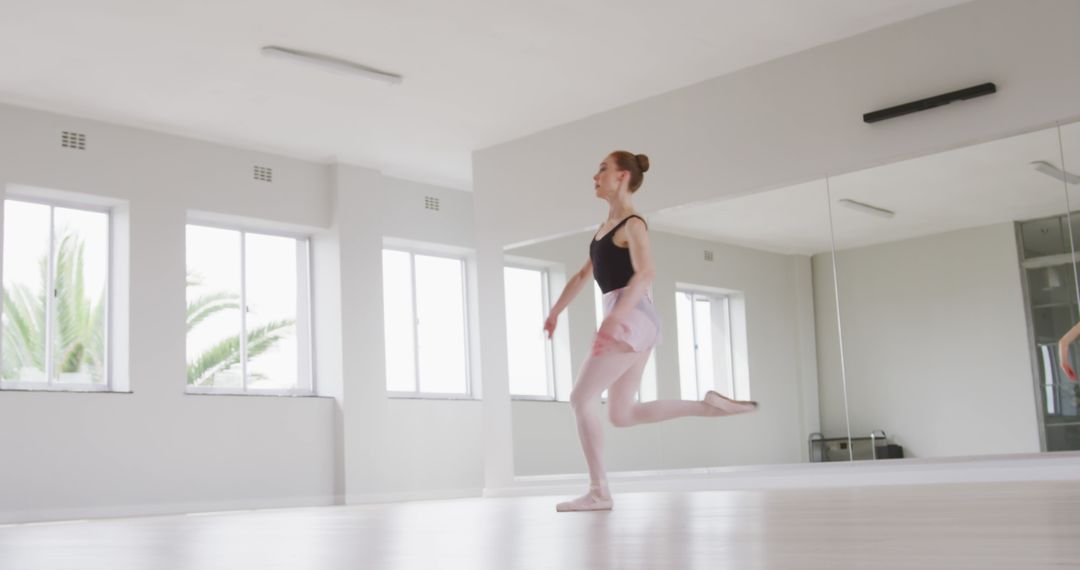 Graceful Ballet Dancer Training in Bright Studio - Free Images, Stock Photos and Pictures on Pikwizard.com