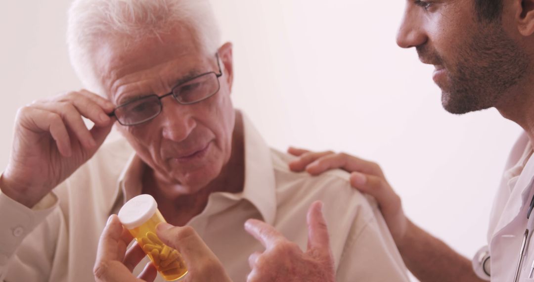 Senior Man Receiving Medical Advice on Prescription Medication - Free Images, Stock Photos and Pictures on Pikwizard.com