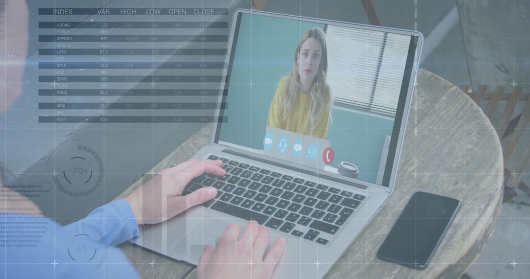 Businesswoman Engaged in Virtual Call with Financial Data Overlay