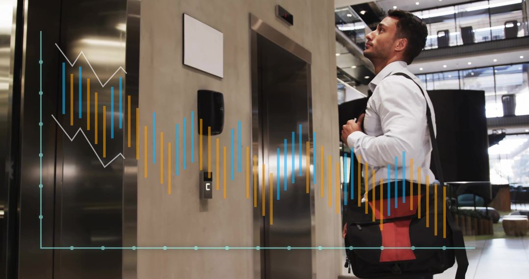 Businessman Analyzing Data Visuals in Modern Office Lobby