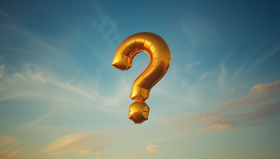 Floating Gold Question Mark Balloon in Vivid Sky