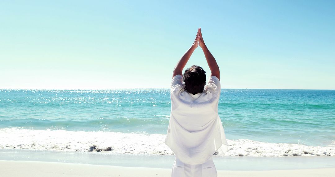 Person Practicing Yoga Meditation on the Beach - Free Images, Stock Photos and Pictures on Pikwizard.com