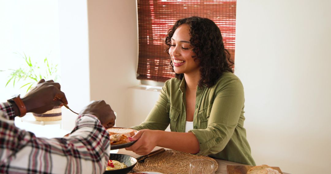 Couple Enjoying Meal Together in Cozy Dining Setting