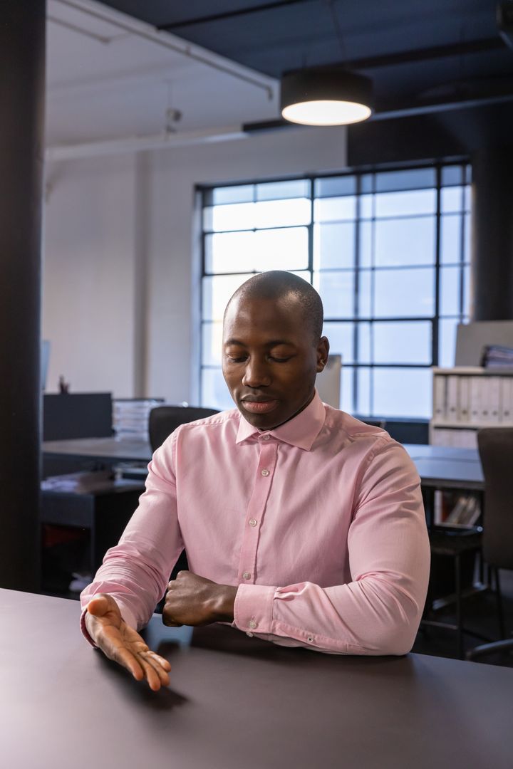 Professional Man in Modern Office Analyzing Serious Issues