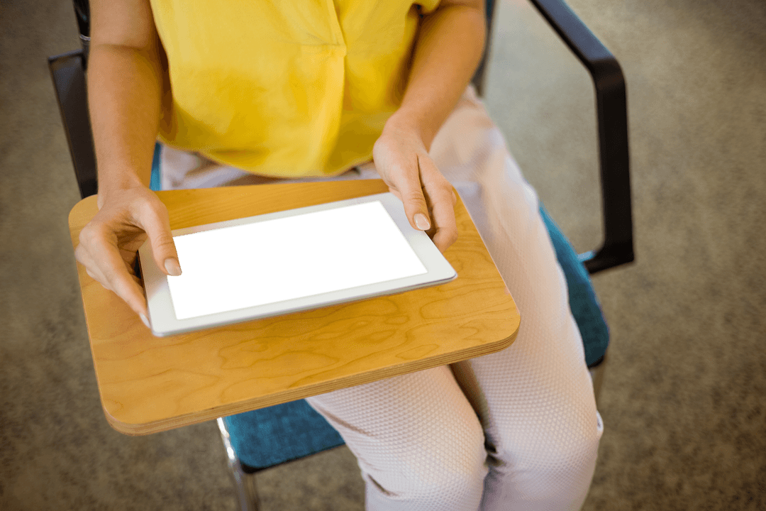 Businesswoman Using Digital Tablet with Blank Screen Overlay in Office
