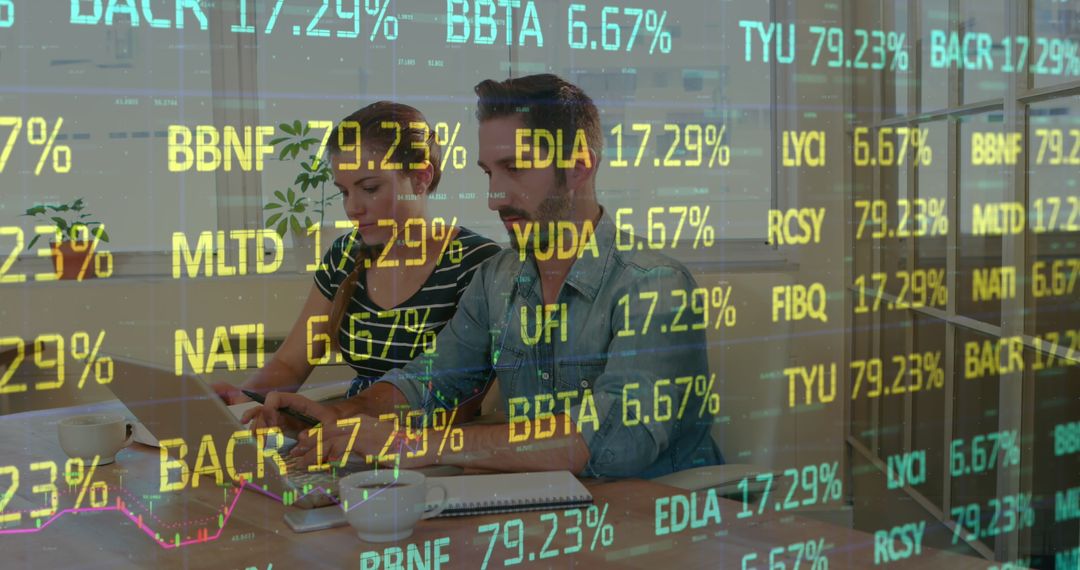 Business Team Analyzing Stock Market Data on Laptop