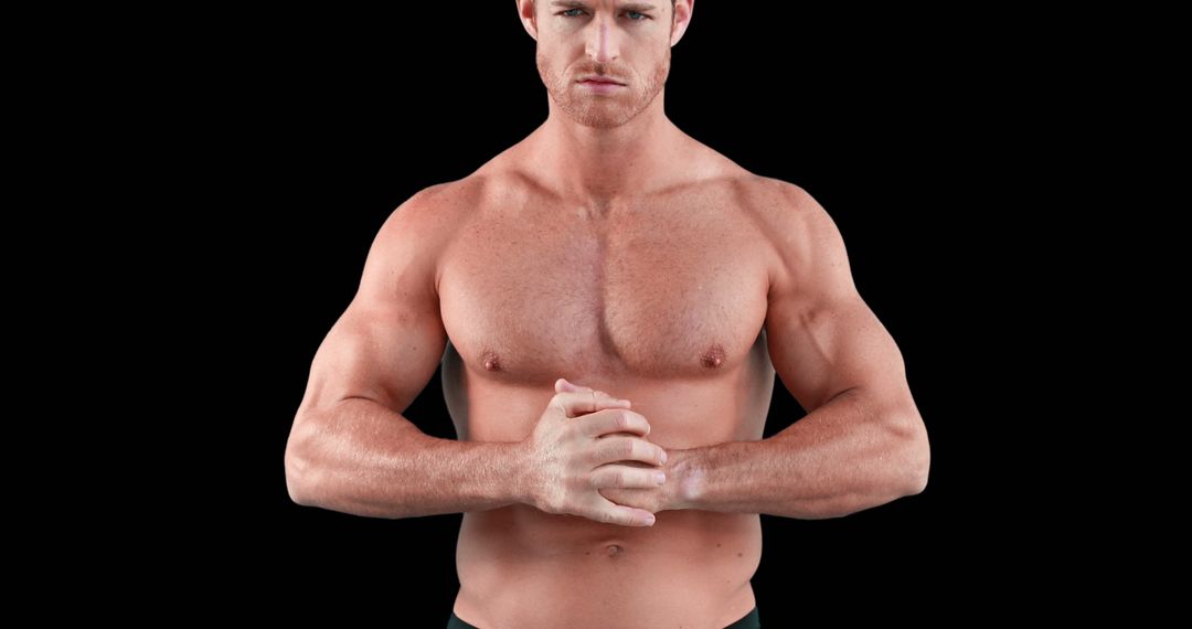 Athletic Man Posing Shirtless Against Black Background - Free Images, Stock Photos and Pictures on Pikwizard.com