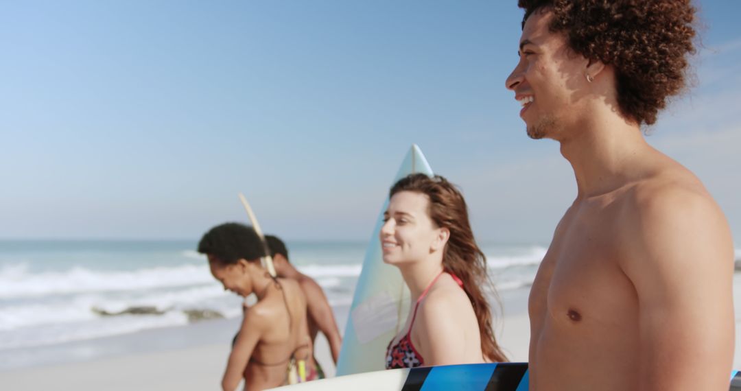 Group of Friends Enjoying Surfing on Summer Beach Day - Free Images, Stock Photos and Pictures on Pikwizard.com