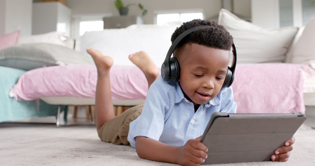 Boy Enjoying Learning on Tablet at Home