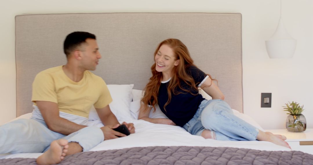 Happy Couple Celebrating Pregnancy News Together Bedside