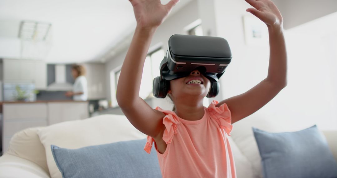 Enthusiastic Child Engaging with Virtual Reality at Home