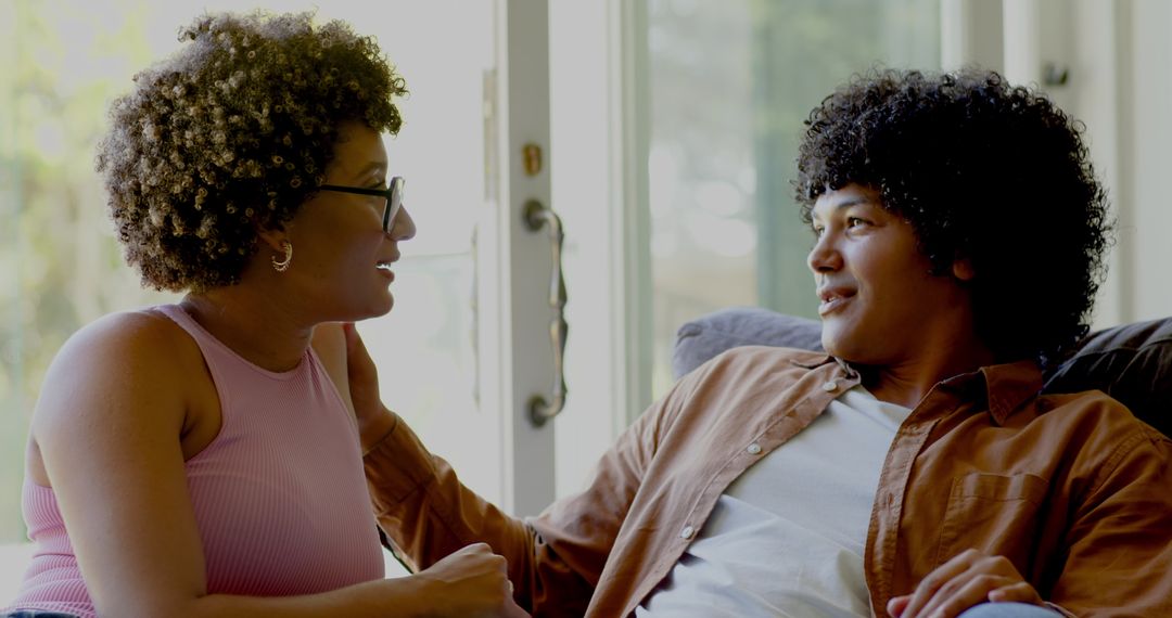 African American Couple Sharing Meaningful Conversation at Home