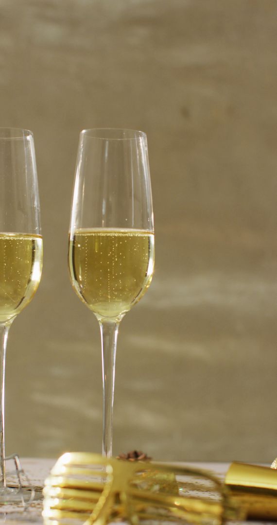 Champagne Glasses with Disco Ball Party Vibe