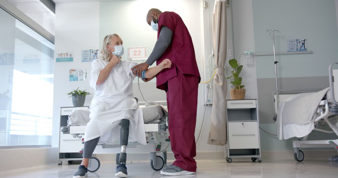 Senior Patient with Prosthetic Leg Receiving Medical Assistance - Free Images, Stock Photos and Pictures on Pikwizard.com