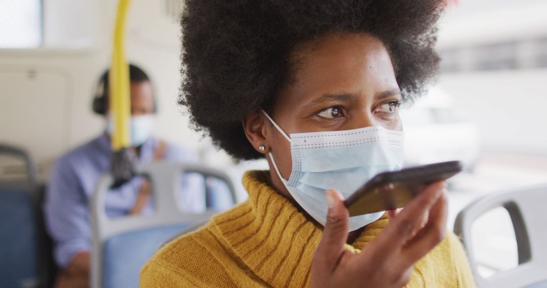 Woman in Mask Talking on Smartphone in Public Transport