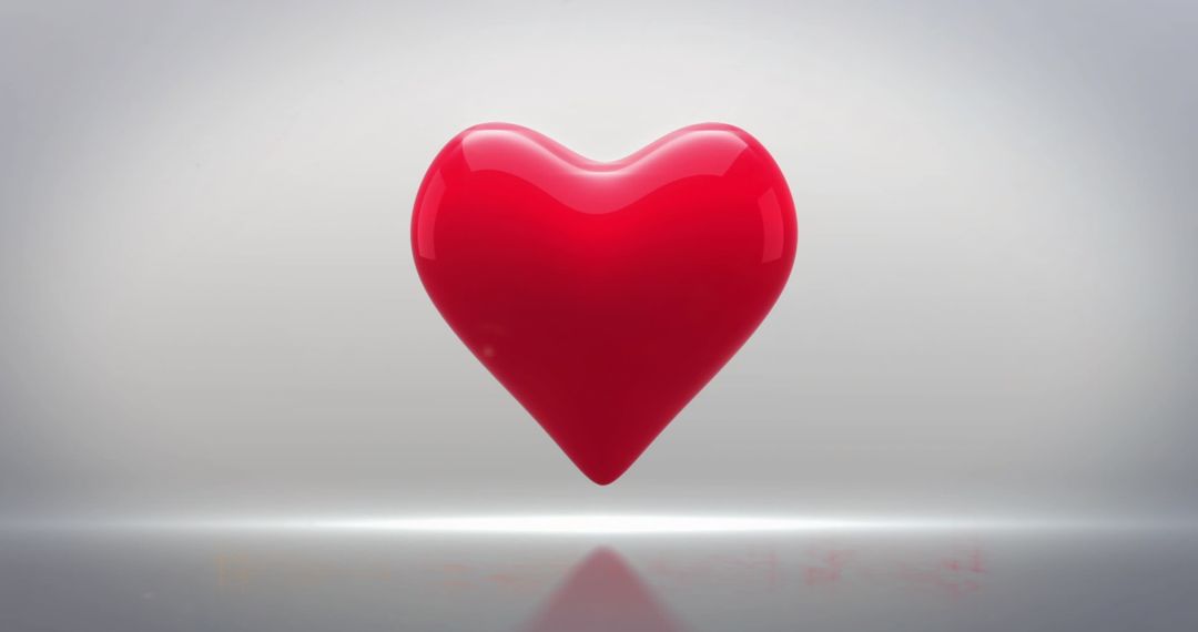 Red Heart Icon Floating on Grey Gradient Background