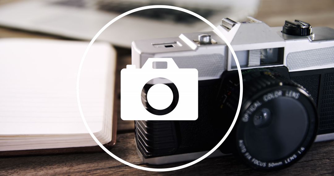 Vintage Camera on Desk with White Circle Icon Overlay