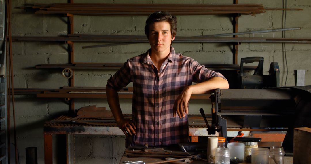 Pensive Woodworker in Plaid Shirt Standing in Workroom - Free Images, Stock Photos and Pictures on Pikwizard.com