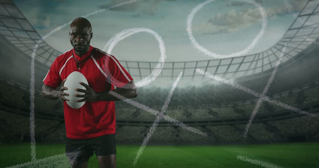 Focused Rugby Player Holding Ball in Stadium Under Game Strategy Plan