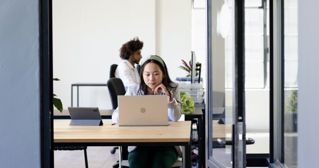 Focused Team Collaboration in Modern Office Space