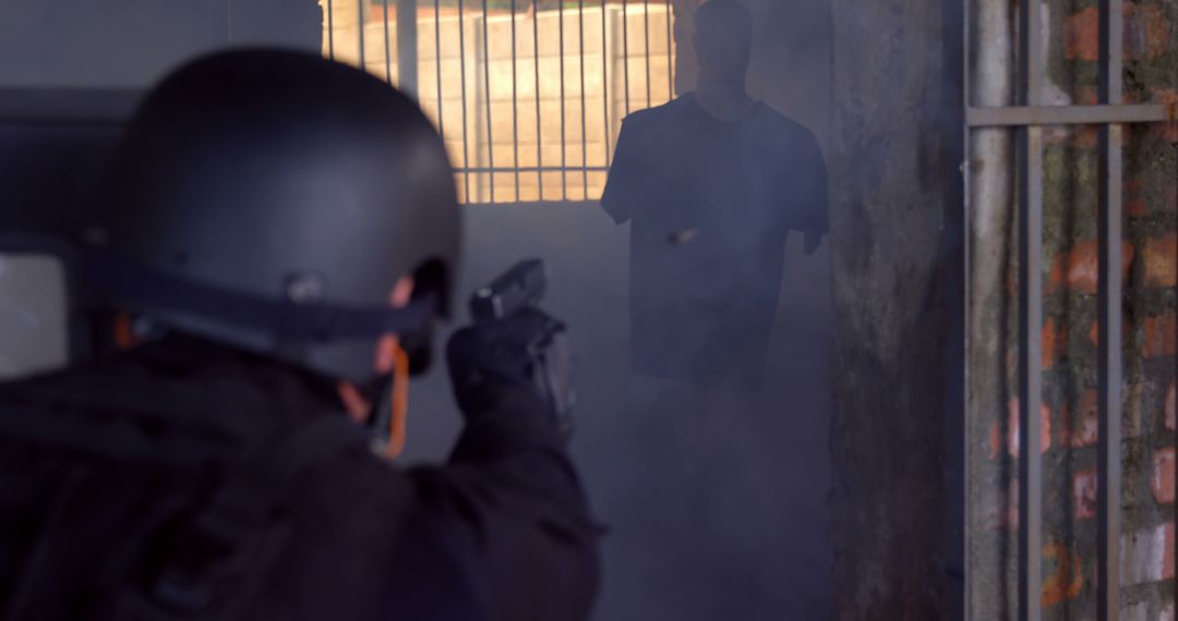 SWAT Officer Aiming Gun During Tactical Operation in Building - Free Images, Stock Photos and Pictures on Pikwizard.com