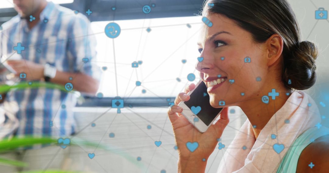 Smiling Woman Engaging in Phone Call Amidst Digital Connections