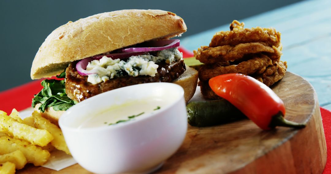 Gourmet Burger with Blue Cheese and Crispy Sides