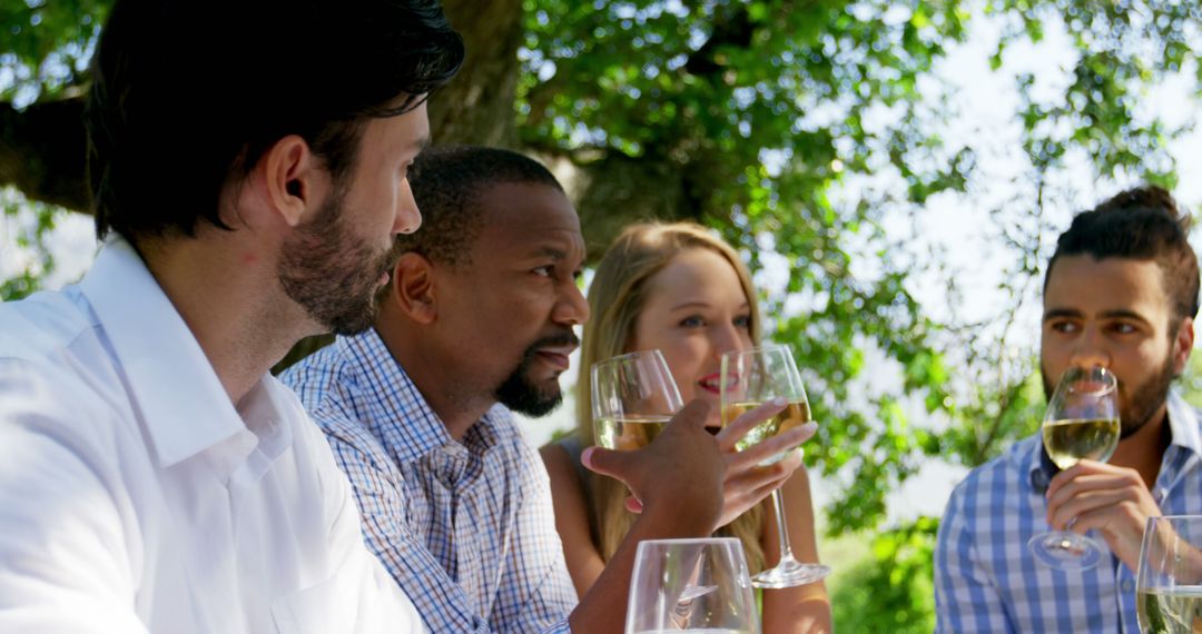 Group of Friends Enjoying Wine Outdoors in Nature - Free Images, Stock Photos and Pictures on Pikwizard.com