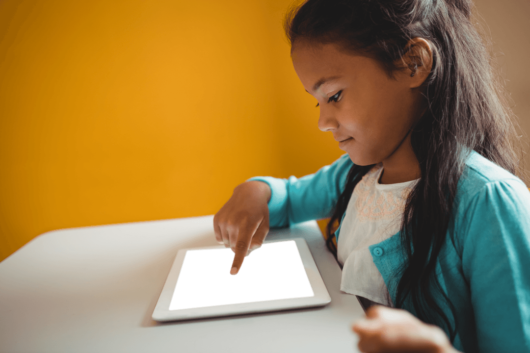 Girl Using Transparent Screen Tablet Indoors