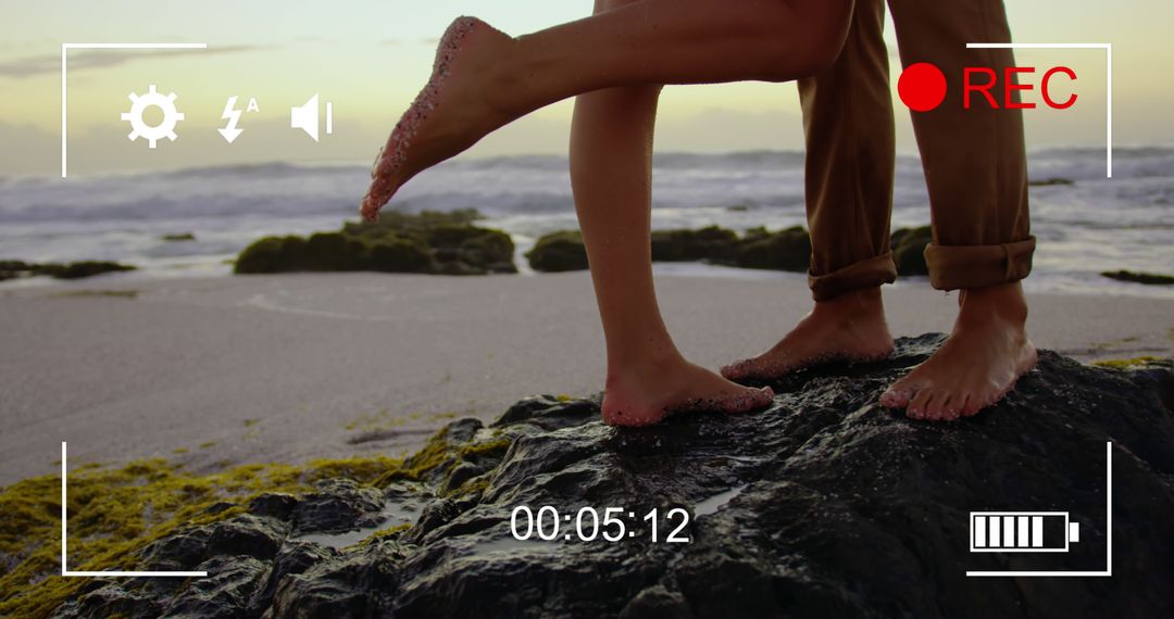 Romantic Couple Embracing on Beach During Sunset Recorded on Camera - Free Images, Stock Photos and Pictures on Pikwizard.com