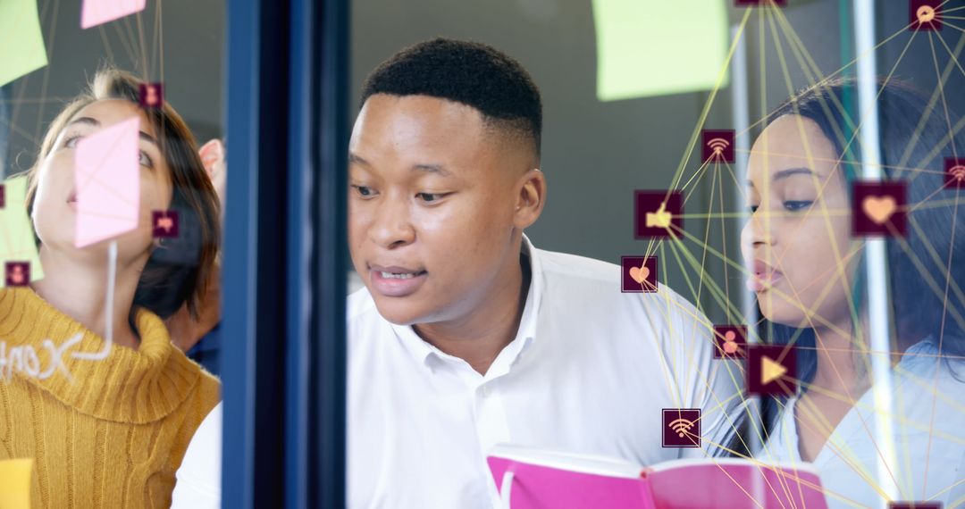 Office Team Collaborating with Digital Interface Icons and Memos