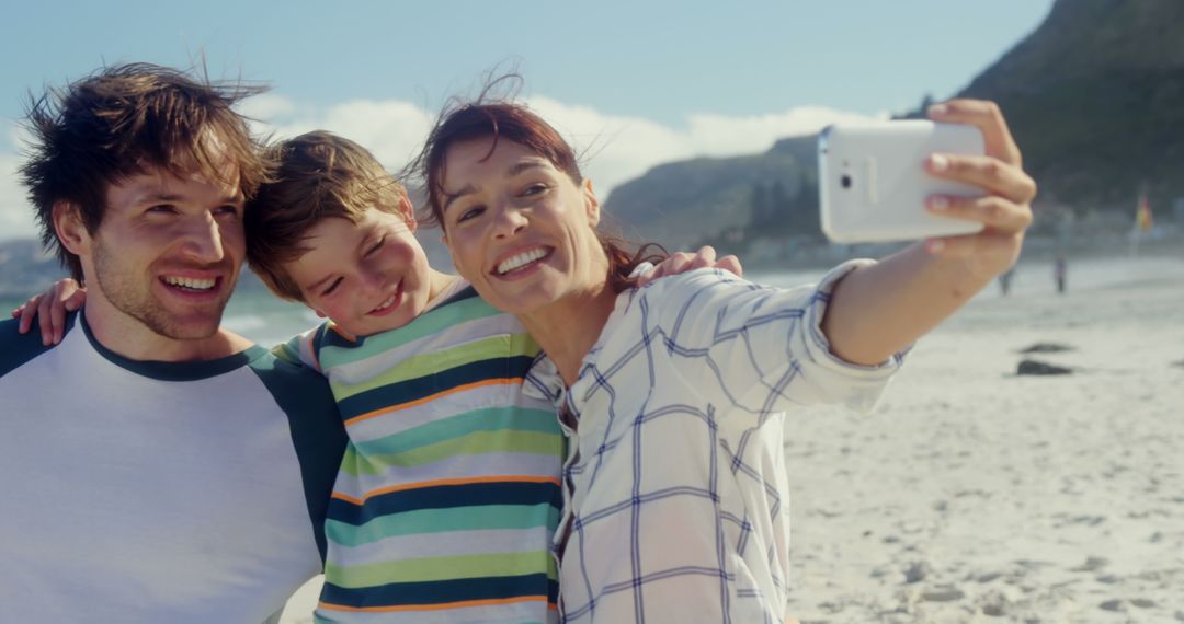 Family Taking Selfie on Beach, Enjoying Sunny Day - Free Images, Stock Photos and Pictures on Pikwizard.com