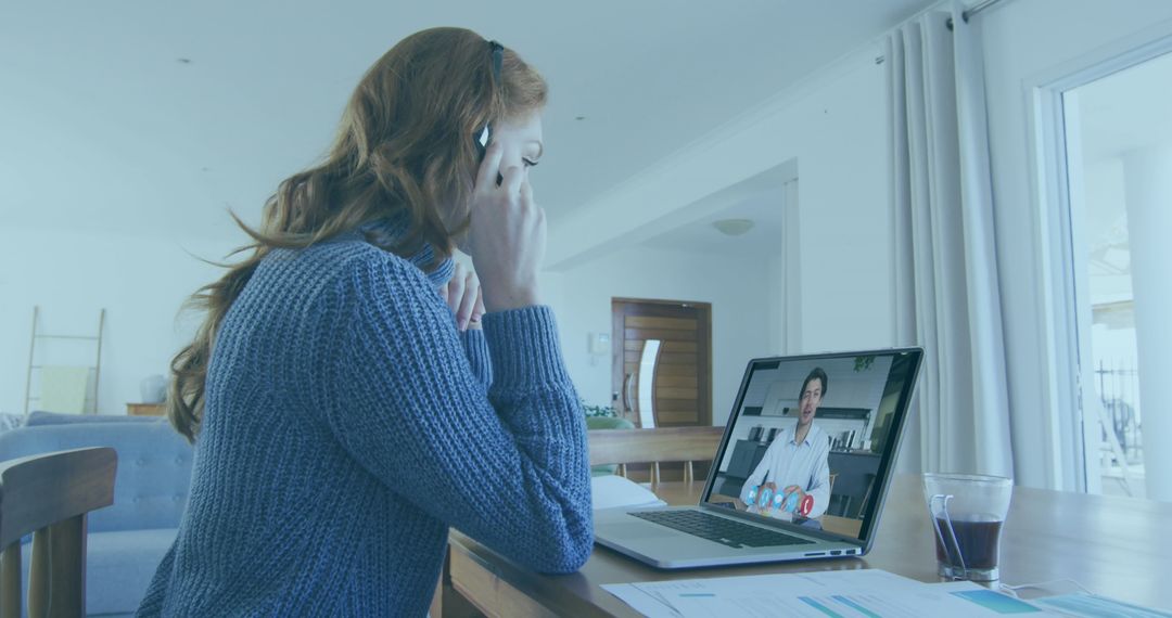 Young Woman Video Conferencing in Modern Home with Minimalistic Decor
