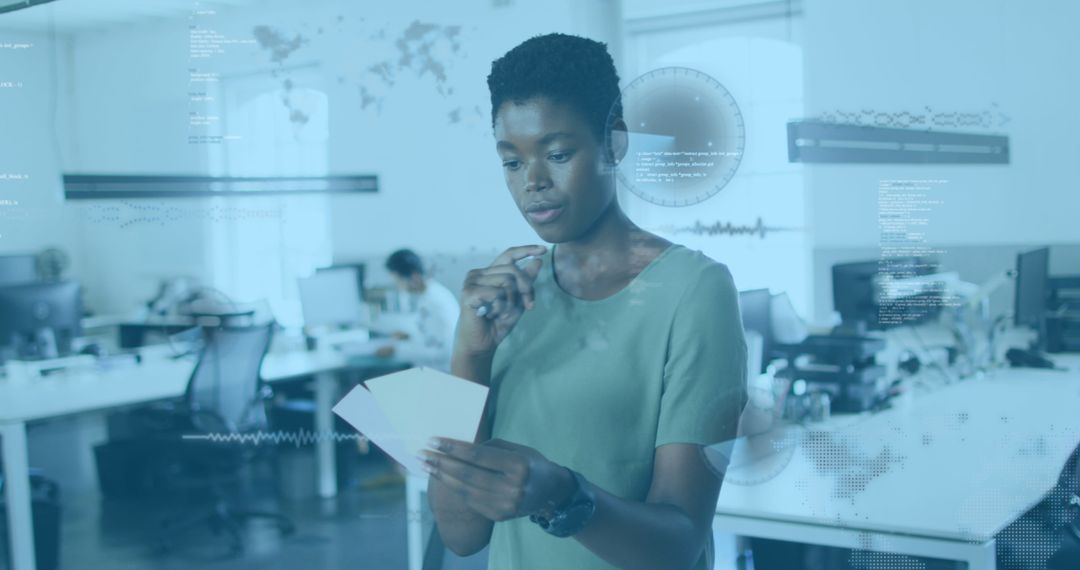African American Businesswoman Analyzing Informative Data in Modern Office