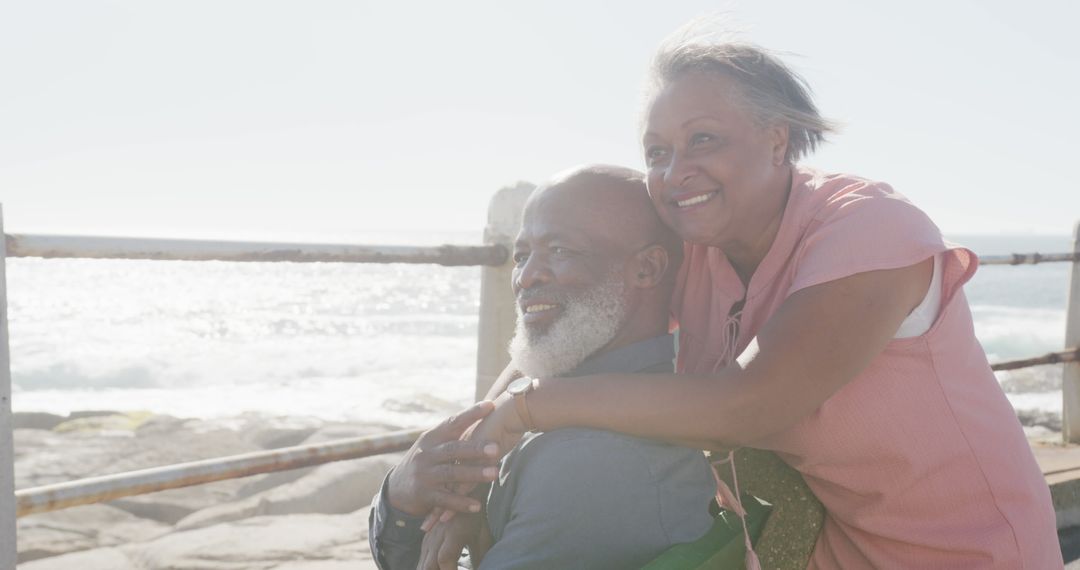 Senior Couple Enjoying Ocean View on a Sunny Day - Free Images, Stock Photos and Pictures on Pikwizard.com