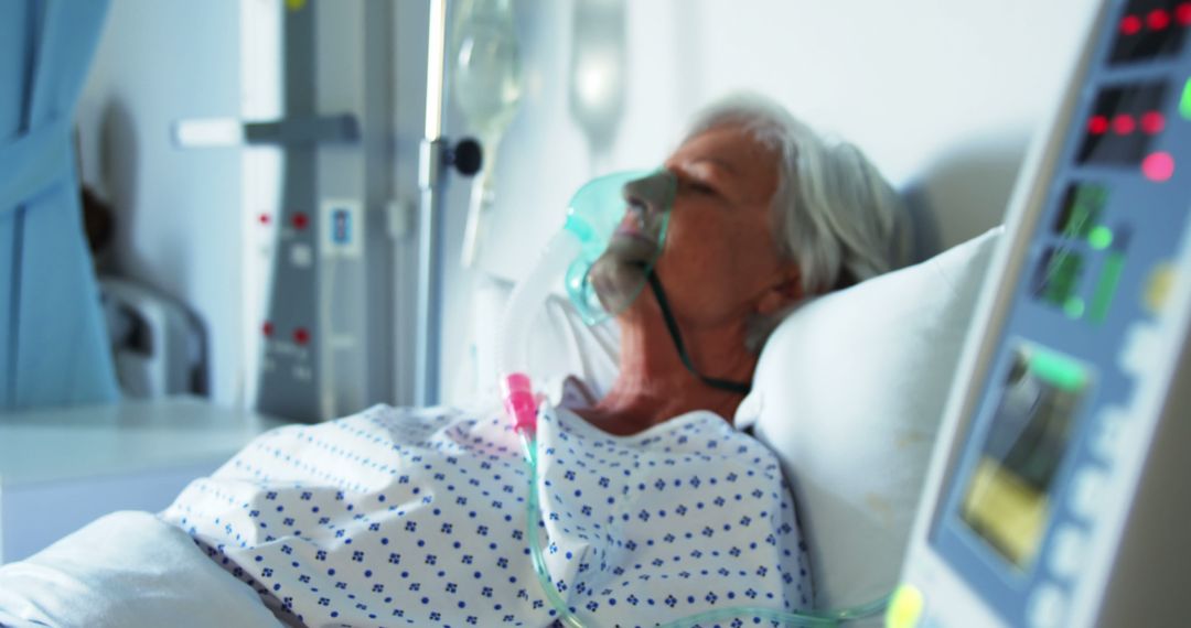 Senior Patient Lying in Hospital Bed with Oxygen Mask - Free Images, Stock Photos and Pictures on Pikwizard.com