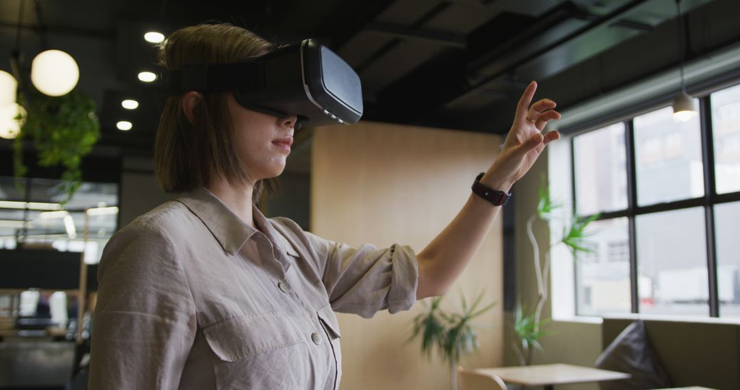 Asian Businesswoman Exploring Virtual Reality in Modern Office Workspace