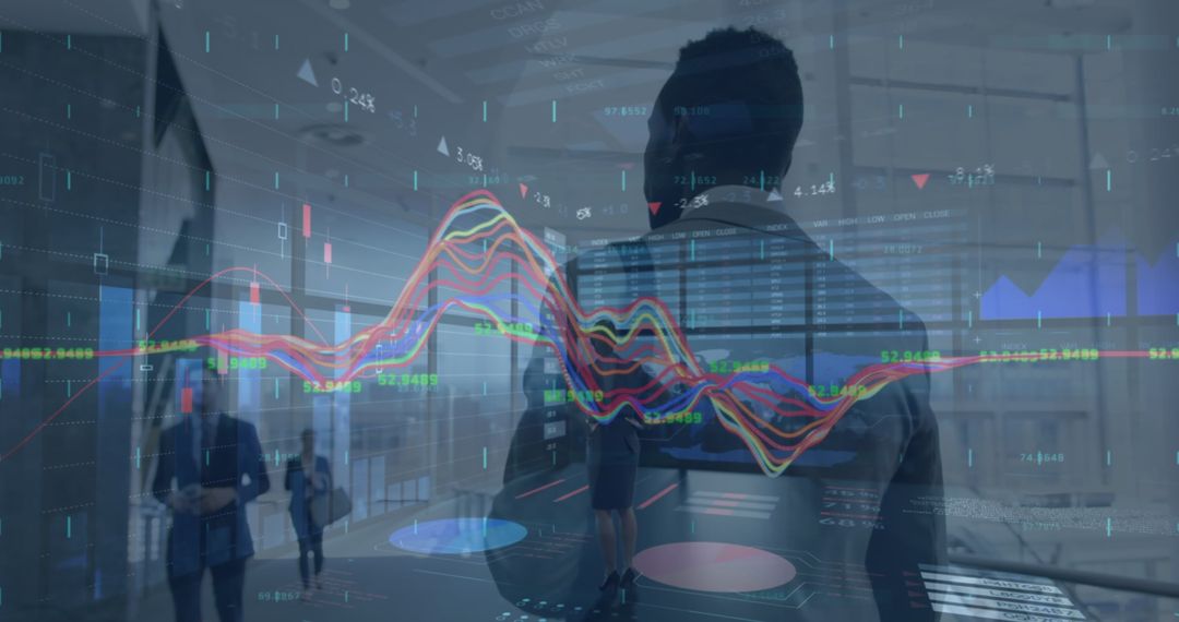 Businessman Walks Through Office with Financial Data Displayed