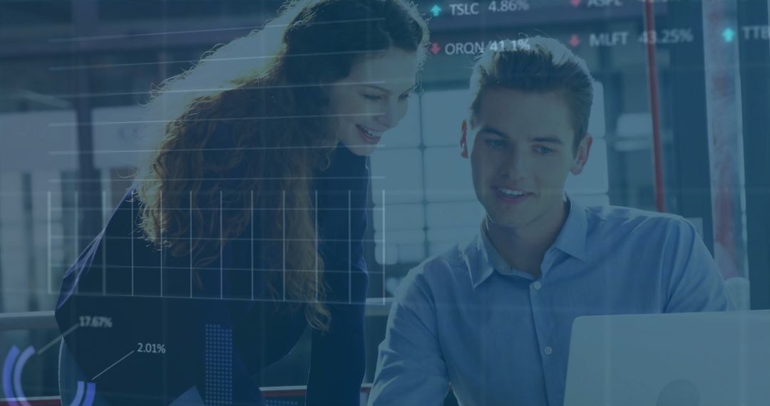 Business Colleagues Analyzing Financial Data on Computer