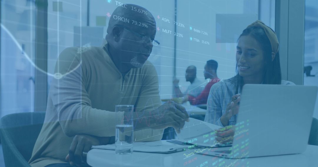 Advisor and Woman Discussing Financial Data at Office Lounge