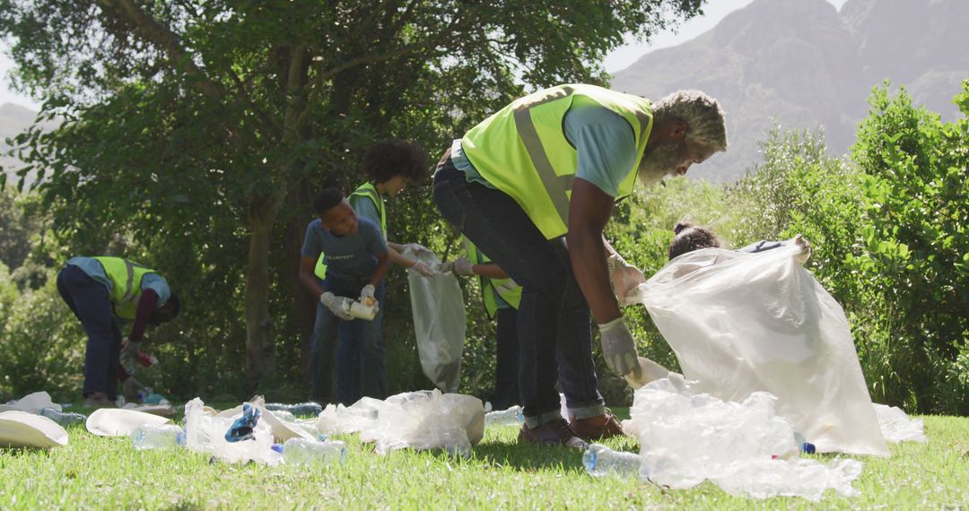 Volunteers Cleaning Outdoor Park Collecting Plastic Waste - Free Images, Stock Photos and Pictures on Pikwizard.com